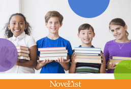 One young girl, two boys, and another girl all holding four books each in their open arms with the spines facing their chest. 