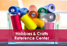 Spools of thread in a glass jar. Hobbies & Crafts Reference Center text in white lettering over a pink block
