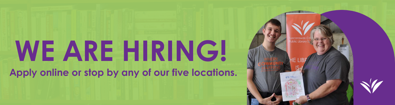 Lime green background with an overlay of books. Purple text reads We are Hiring! Apply online or stop by one of our five locations. Purple arch to the right includes the white logo. In front of the purple arch is a photo of two library staff members smiling holding a thank you card. 