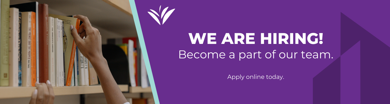 Hands grabbing a book off a bookshelf. White text on a purple background next to the photo reads We are hiring. Become a part of our team. Apply online today. 