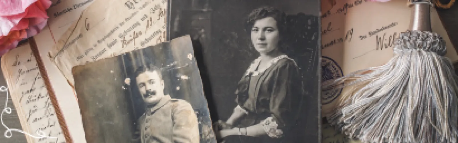 Old photos laying on a journal and other hand written documents.